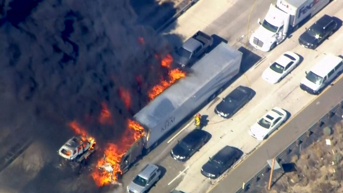 Drivers flee as wildfire engulfs southern California highway