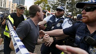 Clashes at 'Reclaim Australia' rallies as rival groups face off