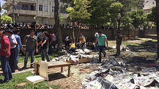 Dozens killed in Turkish-Syrian border town blasts