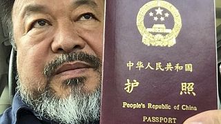 Artist Ai Weiwei's confiscated passport returned after 4 years