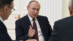 Image: Russian President Putin meets with co-chairs of his campaign office 