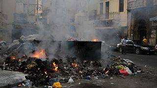 [Watch] Rubbish crisis forces residents to wear face masks in Beirut