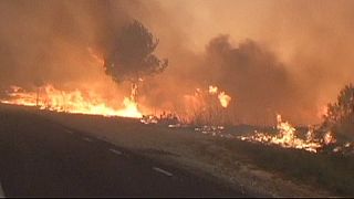 Fires: thousands in emergency shelters as huge blazes take hold in France and Spain