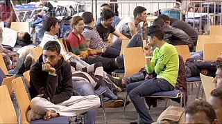 Német regisztrációs központ migránsoknak