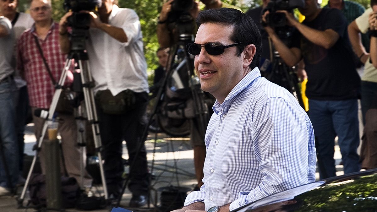 Tsipras warns Syriza anti-bailout rebels of possible early Greece election