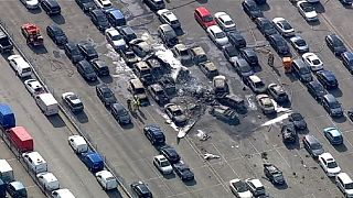 UK: Four dead as private jet crashes into car auction site