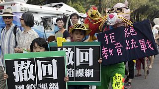 Taiwanese protesters march against controversial textbook changes