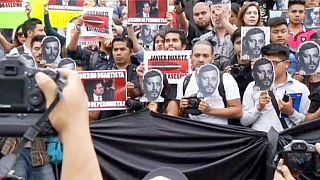 Una manifestación por el asesinato de un periodista y cuatro mujeres culpa al estado mexicano