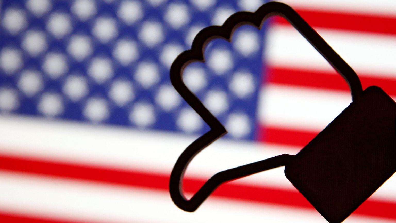 Image: A 3D-printed Facebook Like symbol is displayed inverted in front of 