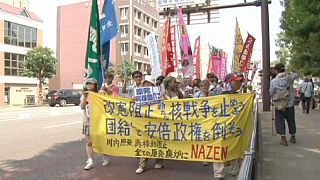 Hundreds rally against security bills as Nagasaki marks bomb anniversary