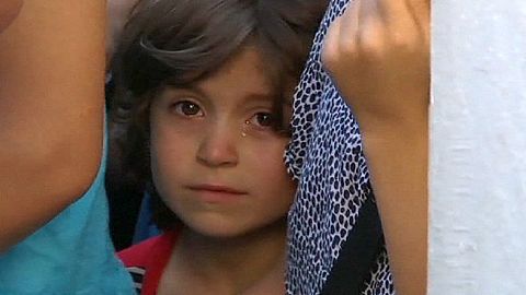Inmigrantes desesperados hacen cola para tener derecho a quedarse en Grecia
