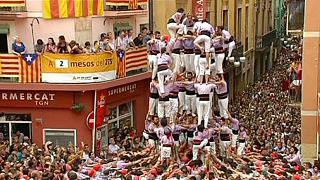 Spanish town celebrates annual 'human tower' festival