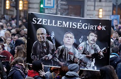 A banner against Orban\'s education policy at a protest in Budapest in March.