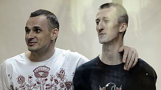 Sentsov sings Ukrainian anthem as jail sentence is read out in Russia