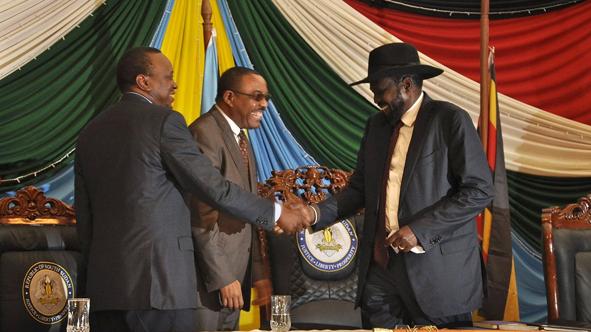 South Sudan's president finally signs delayed peace deal