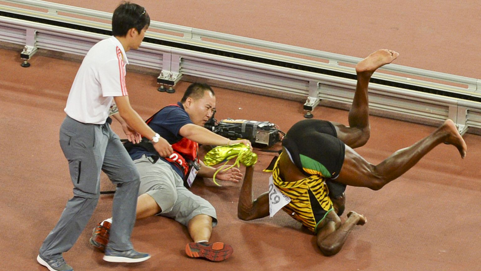 Usain Bolt felled by cameraman on segway
