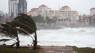 US: Erika downgraded from tropical storm, but still poses flood threat