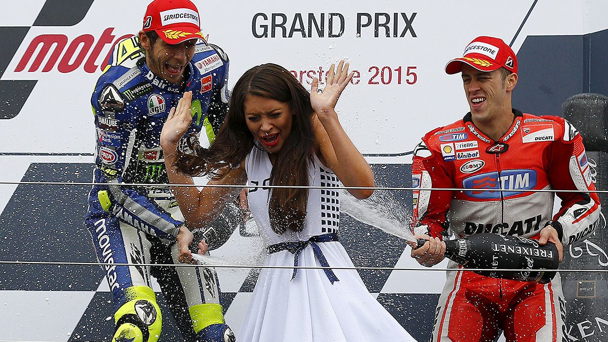 Rossi wins rainy British GP to claim championship lead