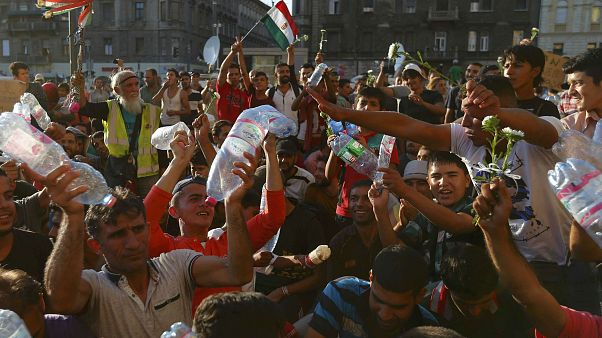 German donations pour in to help migrants caught in the crisis German donations pour in to help migrants caught in the crisis