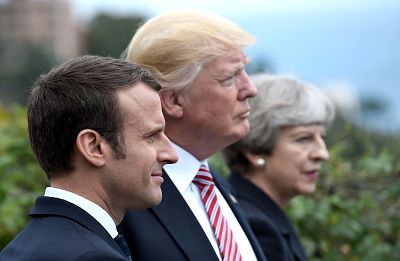 French President Emmanuel Macron, President Donald Trump and Britain\'s Prime Minister Theresa May attend a G7 event in Sicily on May 26, 2017.