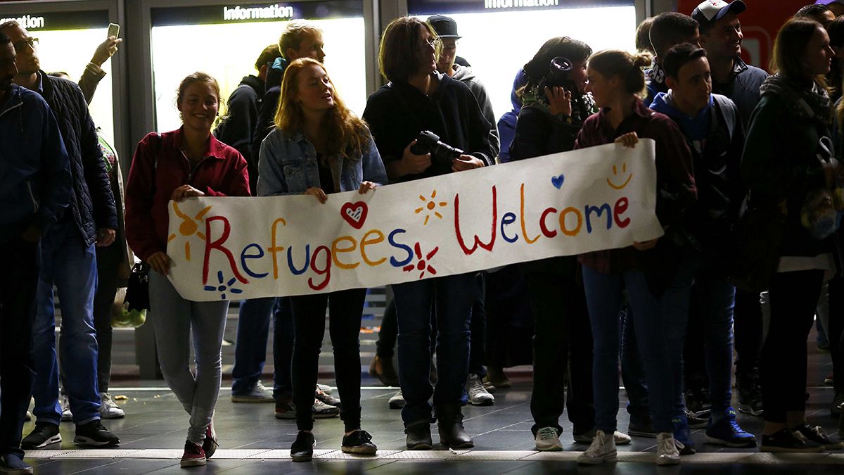 German border and hearts opened to thousands of relieved refugees