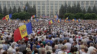 Moldovans protest over banking scandal in a rare show of defiance