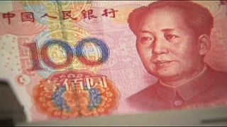 China's foreign reserves suffer biggest monthly fall on record