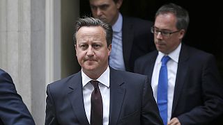 UK's Cameron changes tack on refugees, admits drone killing