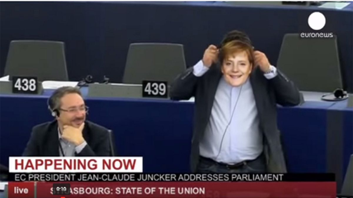 MEP wears Merkel mask in apparent anti-migrants protest