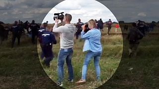 Hungarian camerawoman fired after being filmed kicking migrants