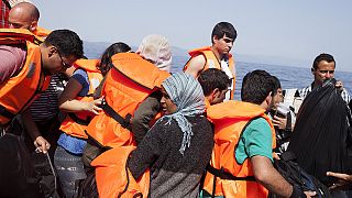 Dinghies packed with migrants continue to arrive on Lesbos