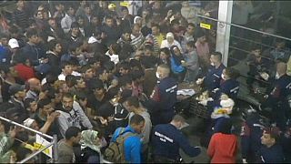 Chaotic pictures from Hungarian refugee centre go viral