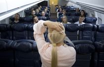 Image: British Airways flight safety instructor Diane Pashley demonstrates