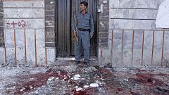 Image: At least nine killed and dozens in suicide bomb attack at voter regi