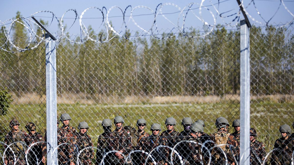 Hungary's new laws, razor fence to sharpen refugee control