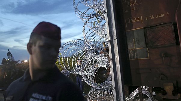 Hungary seals border with razor wire Hungary seals border with razor wire