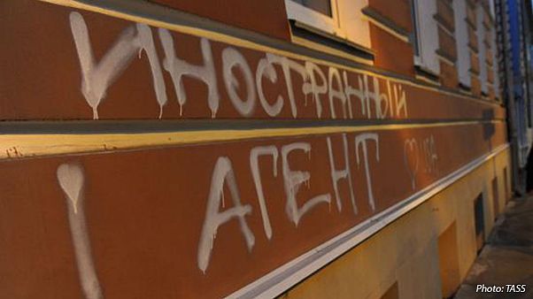 Charity boss flees with young kids after Russia's NGO crackdown Charity boss flees with young kids after Russia's NGO crackdown