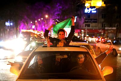 Iranians celebrate after the preliminary nuclear deal was reached in April 2015.