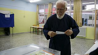 Greek voters go to polls in election too close to call