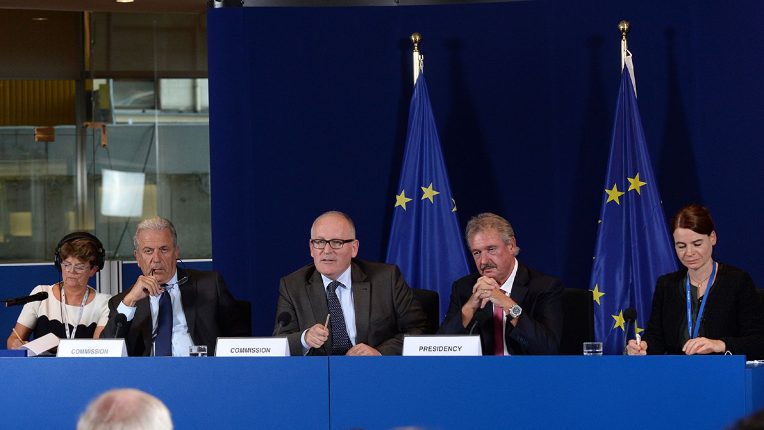 EU ministers approve migrant relocation plan in face of eastern opposition