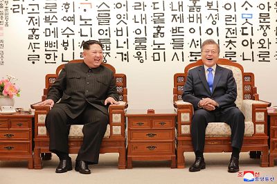North Korean leader Kim Jong Un (left) meets with South Korean President Moon Jae-in (right) before their summit on Friday.