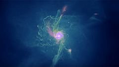 Image: A still from a simulation of a galaxy and its supermassive black hol