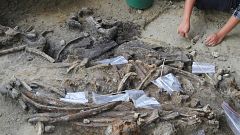 Image: An archaeologist works at the site of an archaeological dig where a 