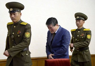 A man who identified himself as Kim Dong Chul, a naturalised American citizen and arrested in North Korea.