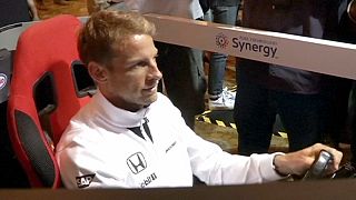 Button joins 300 club with another year at McLaren