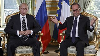 Paris hosts Ukraine summit as Syria simmers in the background