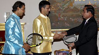 Tennis: Djokovic and Nadal give racquets to Thai PM