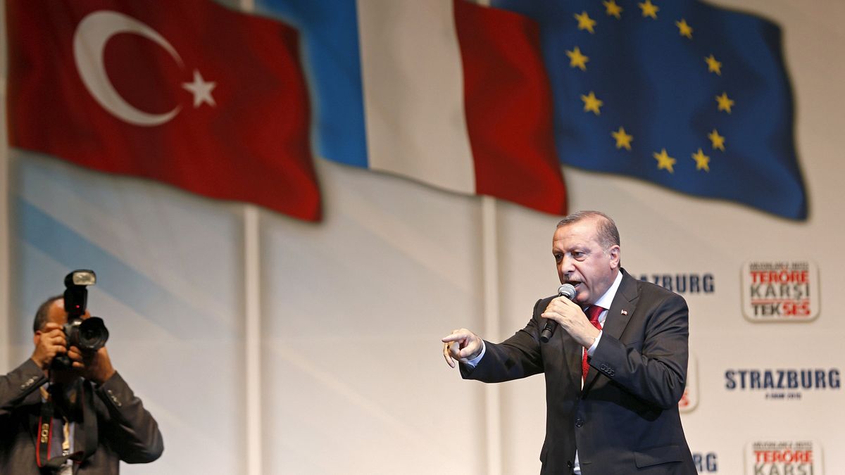 Turkish president accused of electioneering on foreign trip