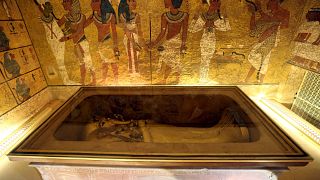 Image: The golden sarcophagus of King Tutankhamun in his burial chamber is