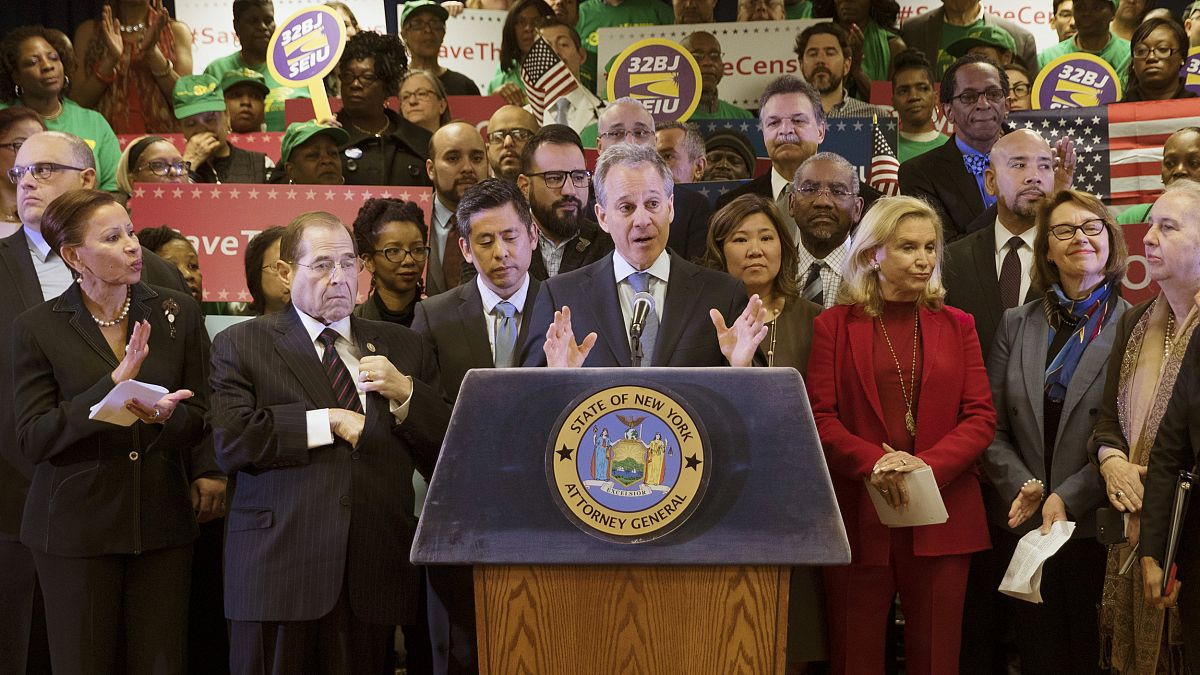 Image: Schneiderman speaks during a news conference